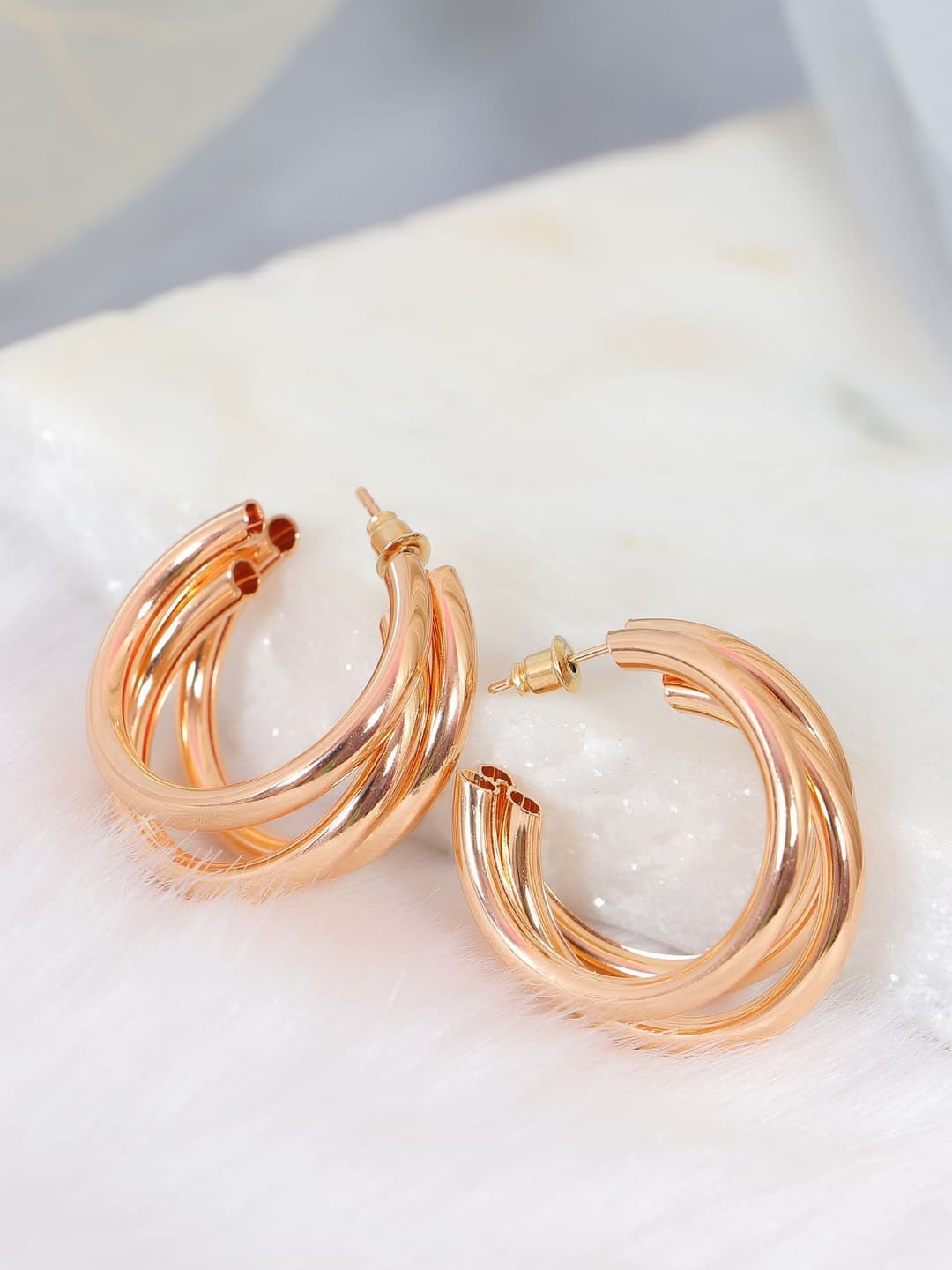 Paradiso Glitz: Rose-Gold Half Hoop Earrings for Fashion-Forward Women