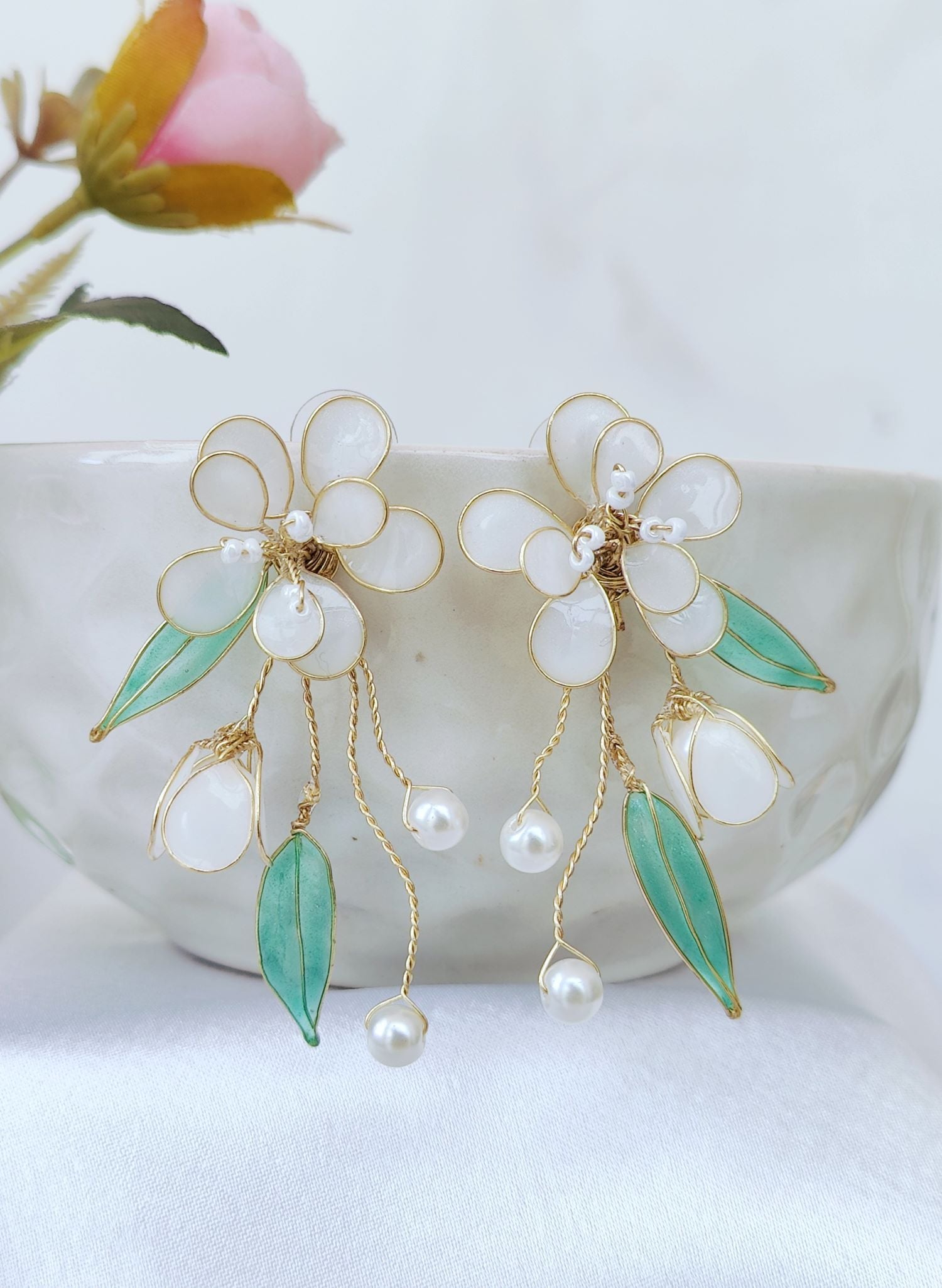 Handmade White Flower Resin Earrings with Green Leaf