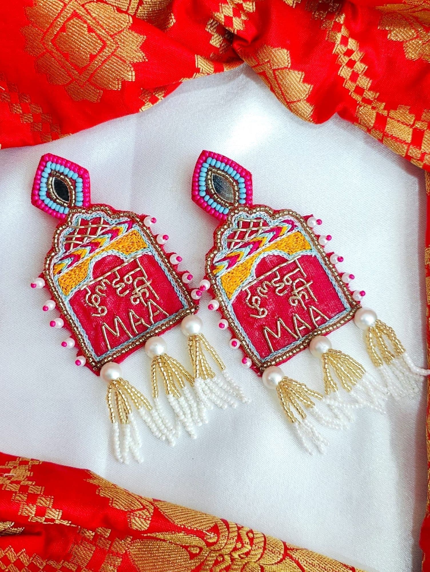 Pink beaded animal-themed drop and dangler earrings, ideal for women and girls attending weddings in summer or spring, part of the HANDICRAFT collection