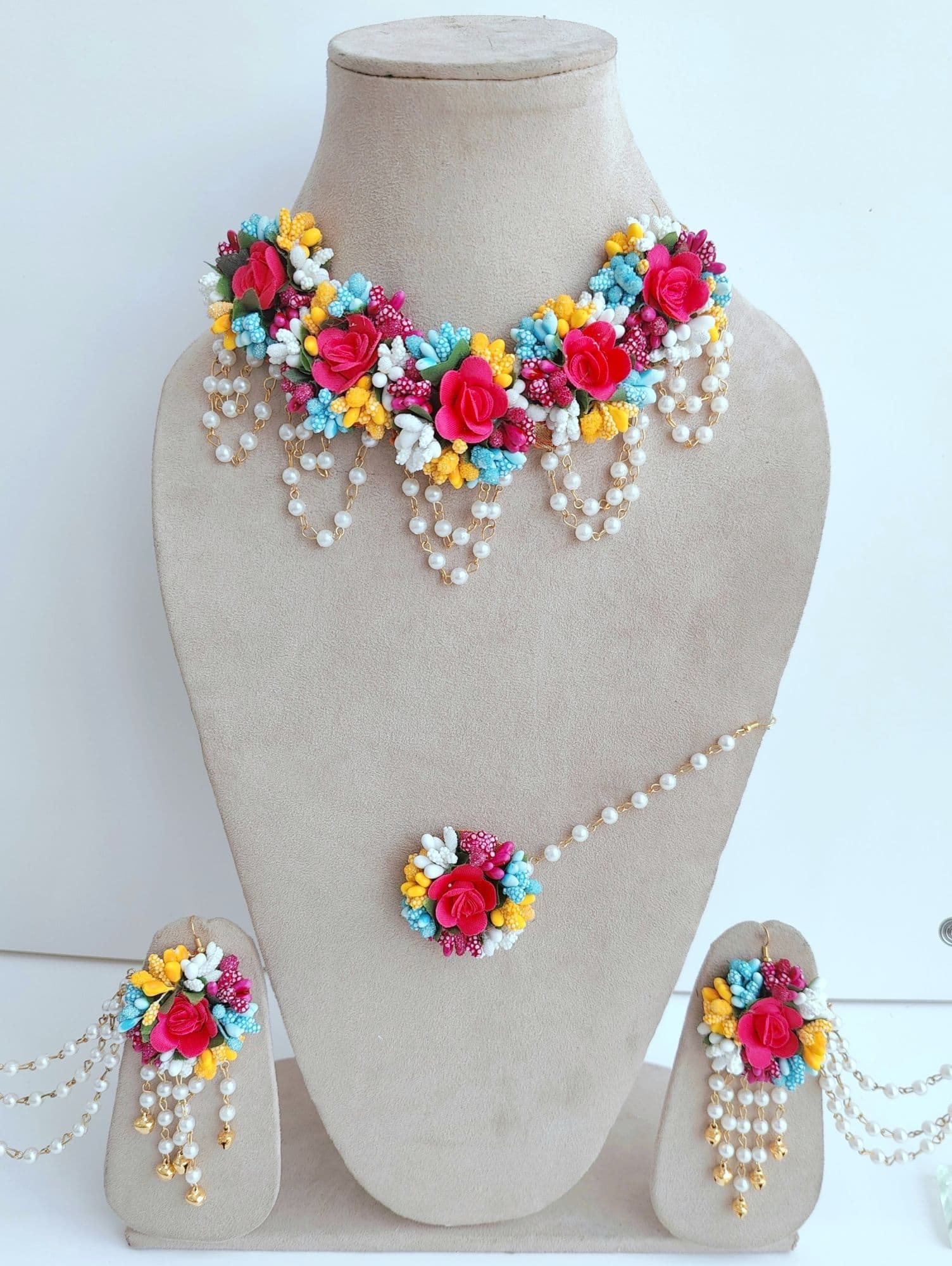 Handmade multicolored artificial floral jewellery set, ideal for women and girls for weddings, haldi, mehndi or baby showers.