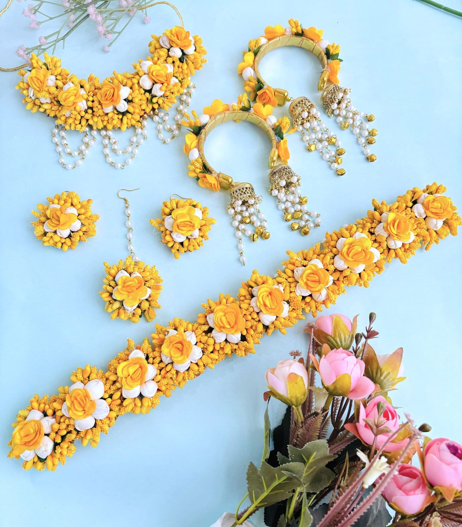 Handmade white-yellow floral jewellery set, ideal for baby shower, haldi, and mehndi occasions for women and girls
