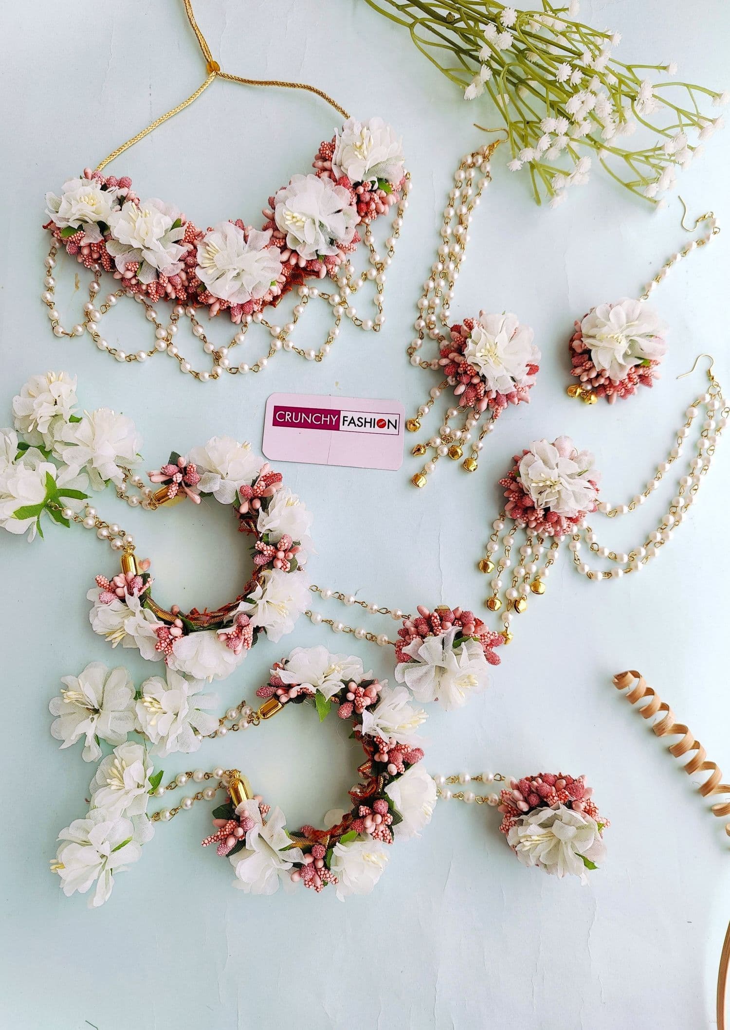 Handcrafted white-peach floral jewellery set, perfect for women and girls attending weddings, haldi, mehndi or baby showers.