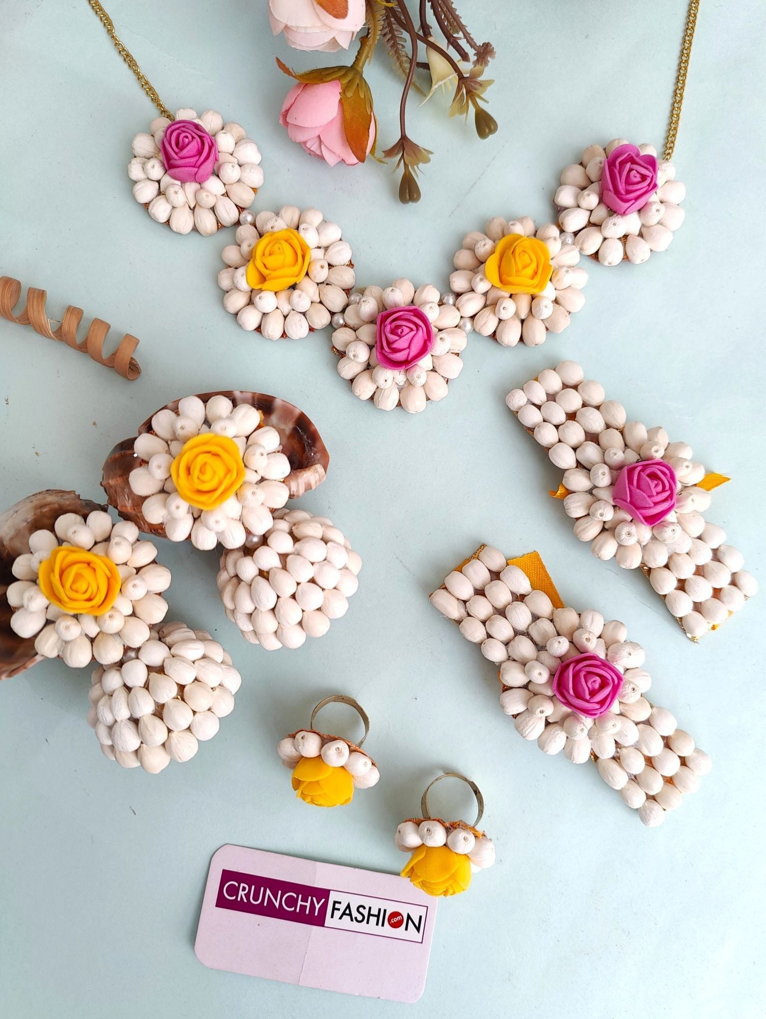 White Floral Haldi Jewellery Set for Women with Pink and Yellow Roses