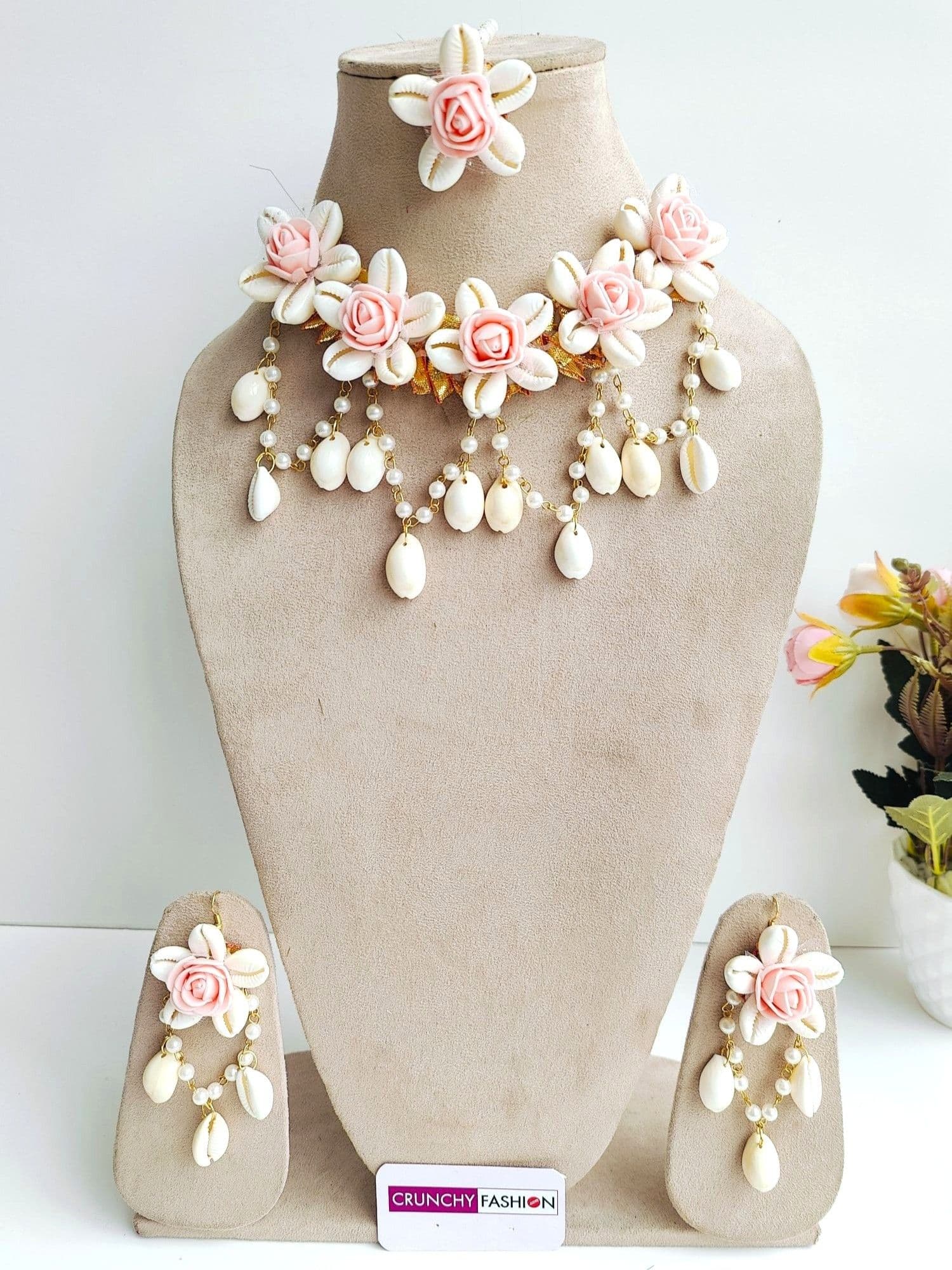 Handmade peach flower and cowrie shell bridal jewellery set, ideal for wedding and haldi ceremonies