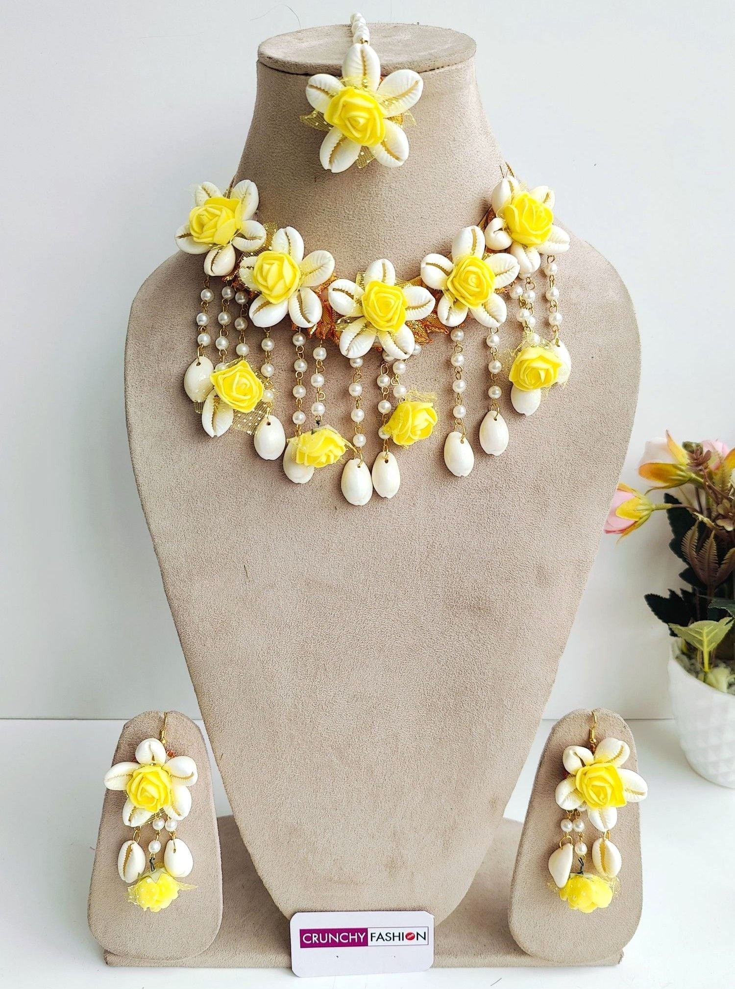 Bridal Bloom: Yellow Flower & Cowrie Shell Jewelry for Haldi