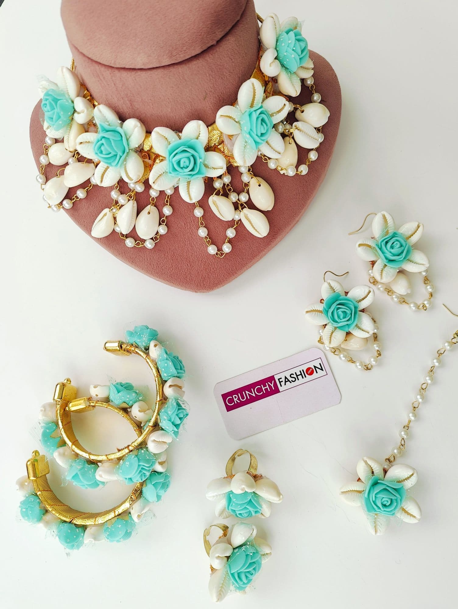 Floral green Haldi jewelry set handmade from sea shells, perfect for brides, wedding events, and Haldi ceremonies.