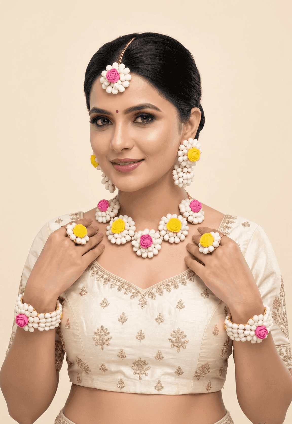 White Floral Haldi Jewellery Set for Women with Pink and Yellow Roses