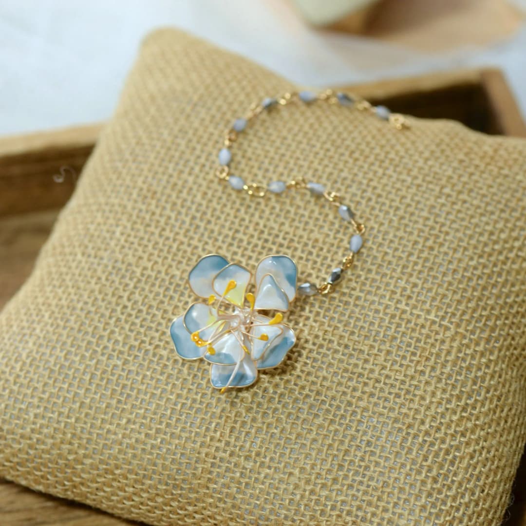 Handcrafted Floral Designer Resin Maang Tikka with Pearl Accents