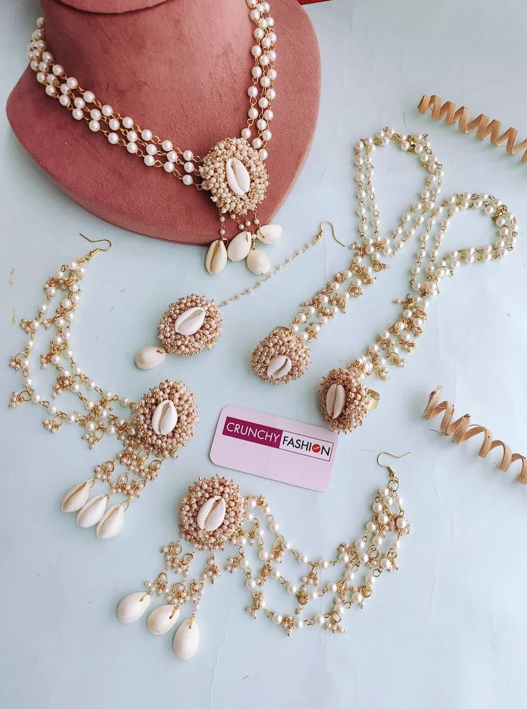 Pearl And Cowrie Shell Haldi-Mehndi Jewellery/products/designer-shell-pearl-harmony-white-wedding-and-haldi-ceremony-jewellery-set-CFS0750Pearl And Cowrie Shell Haldi-Mehndi Jewellery