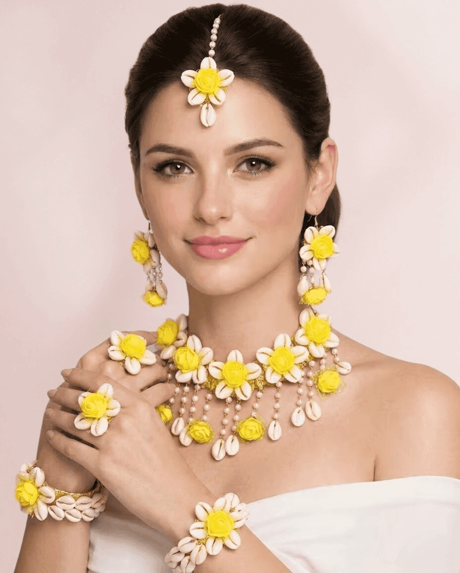 Bridal Bloom: Yellow Flower & Cowrie Shell Jewelry for Haldi