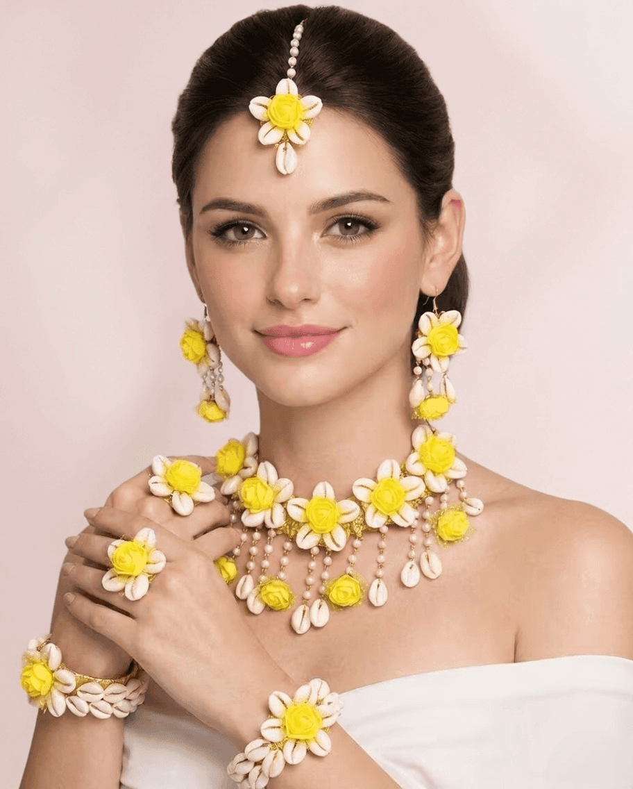Bridal Bloom: Yellow Flower & Cowrie Shell Jewelry for Haldi